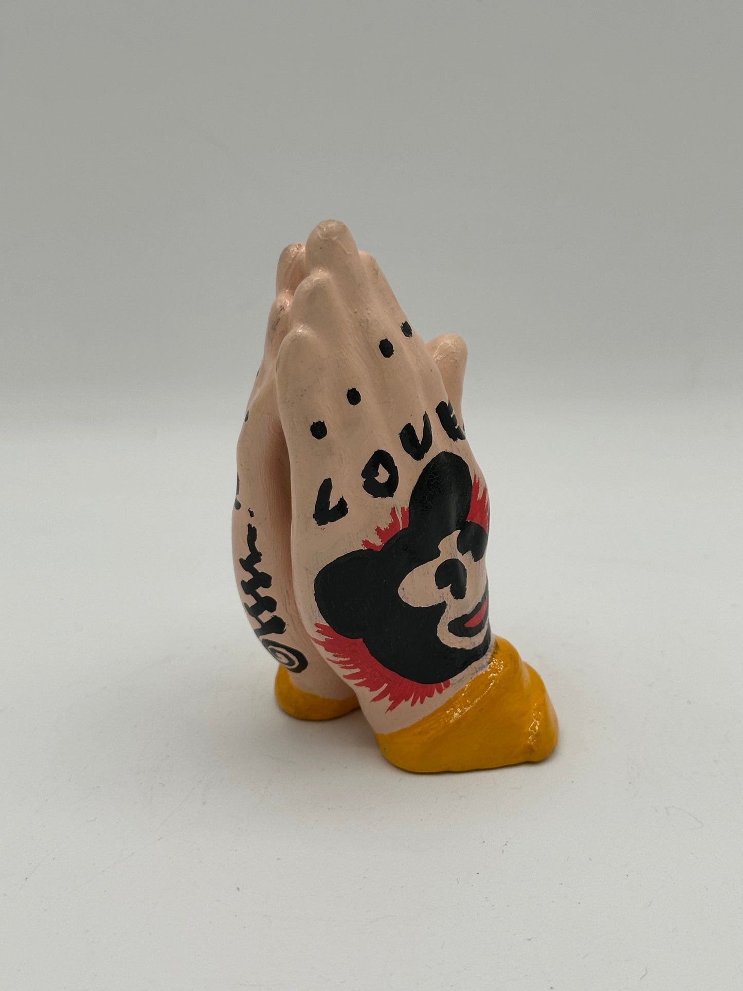 Praying hands (yellow)