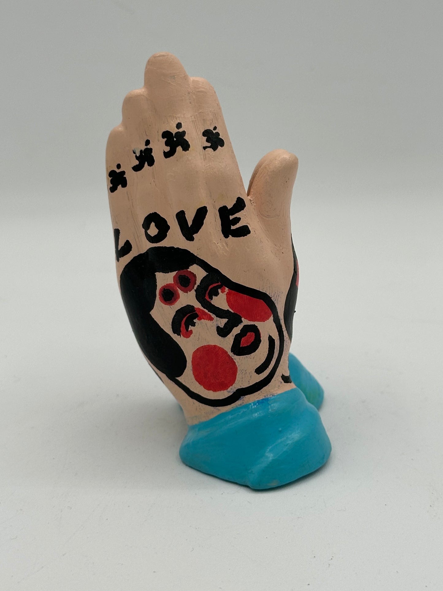 Praying hands (blue)