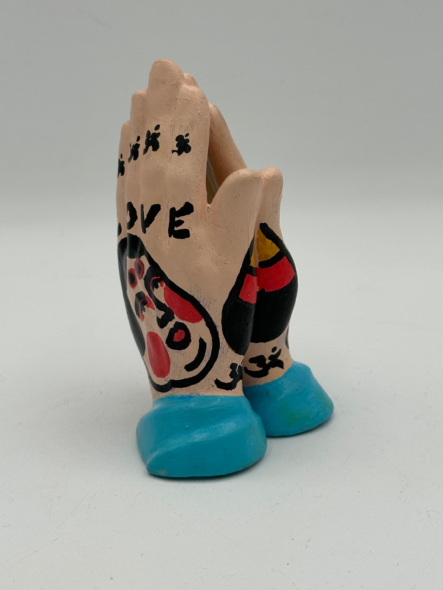 Praying hands (blue)