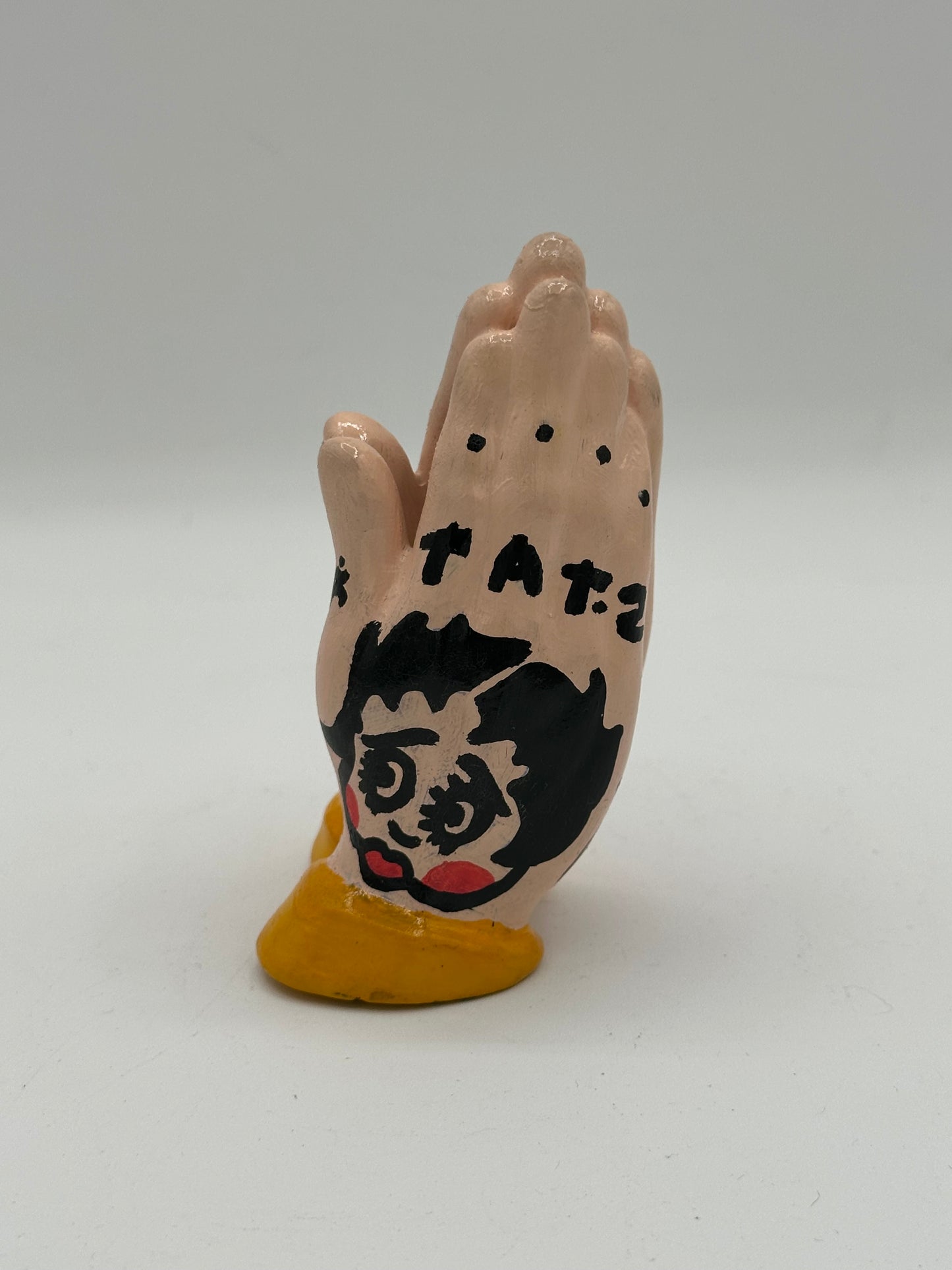 Praying hands (yellow)