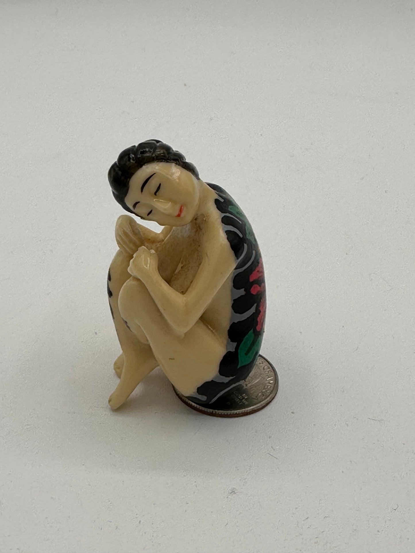 Woman with backpiece (2 inches)