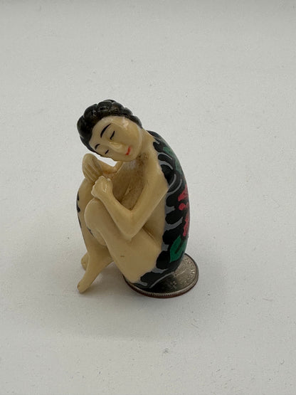 Woman with backpiece (2 inches)