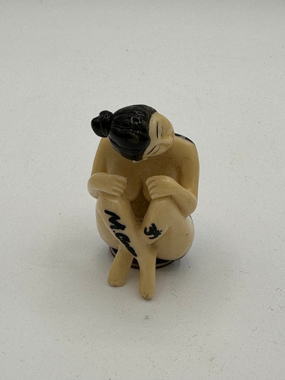 Woman with backpiece (2 inches)