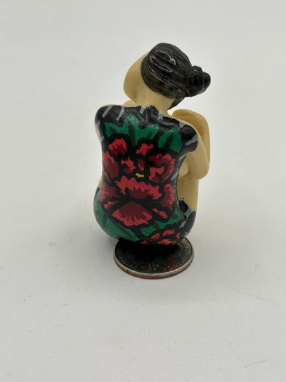 Woman with backpiece (2 inches)