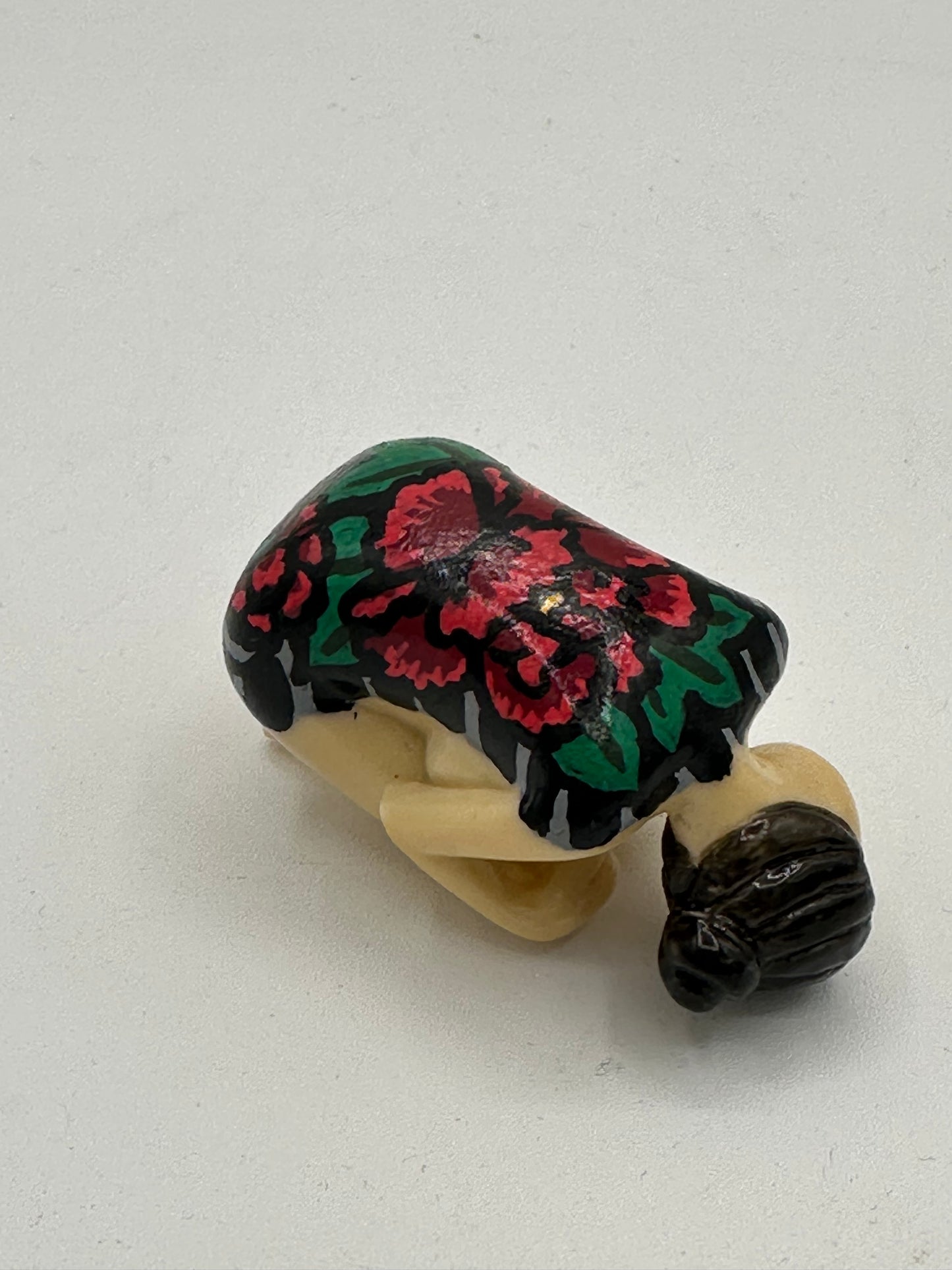 Woman with backpiece (2 inches)