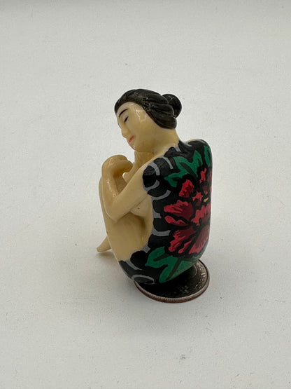 Woman with backpiece (2 inches)