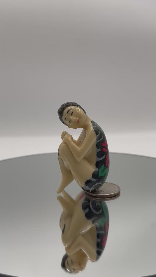 Woman with backpiece (2 inches)